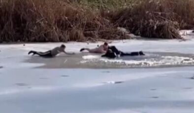 Buz tutan göle düşen çocukları kurtarırken kendileri de göle düştü! Donmaktan son anda kurtuldular
